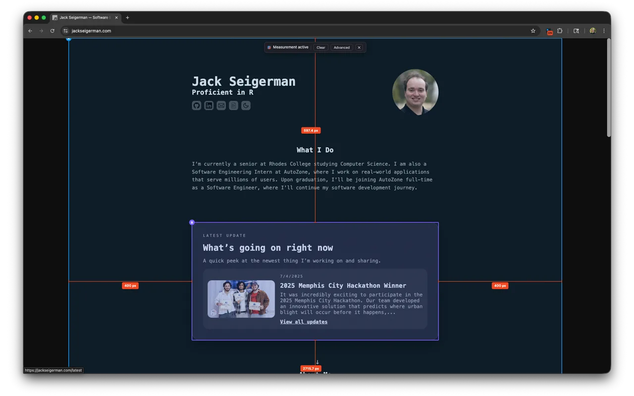 PixelSpan measuring a dark portfolio homepage in Chrome. Red guide lines cross the page with orange labels reading 400 pixels on each side and 597.4 pixels down the middle, and a floating toolbar at the top reads Measurement active.